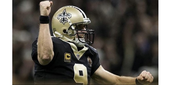 Drew Brees hjälpte New Orleans Saints att vinna matchen men gick i pension skadad